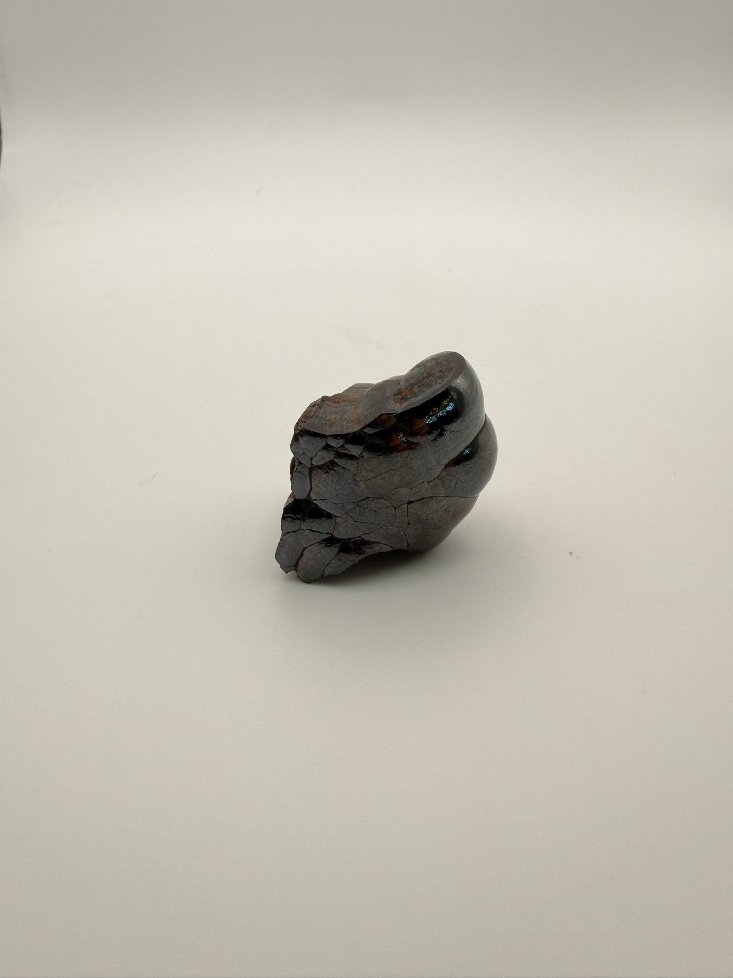 Small raw hematite specimen.