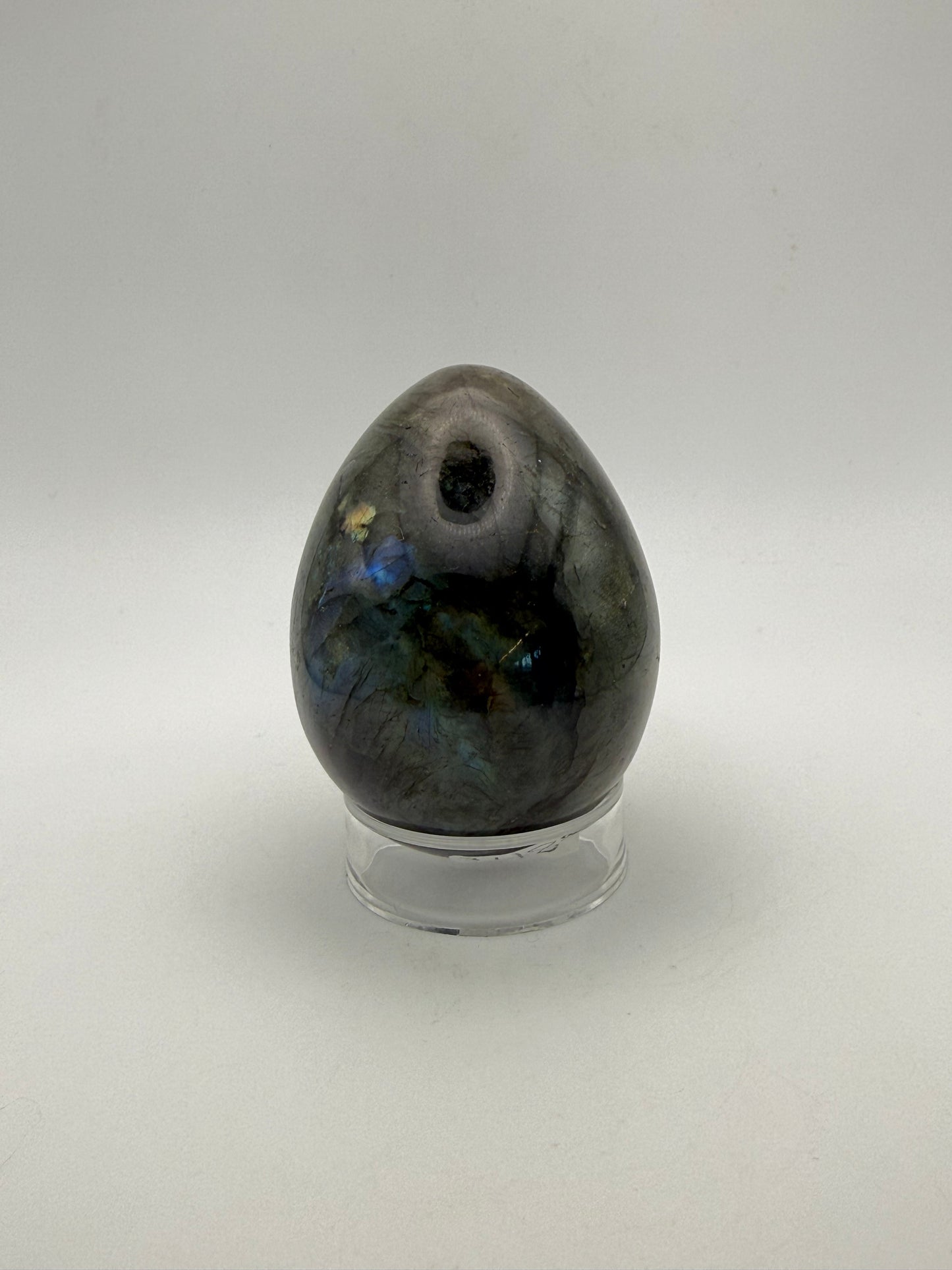 Labradorite polished stone in the shape of an egg.