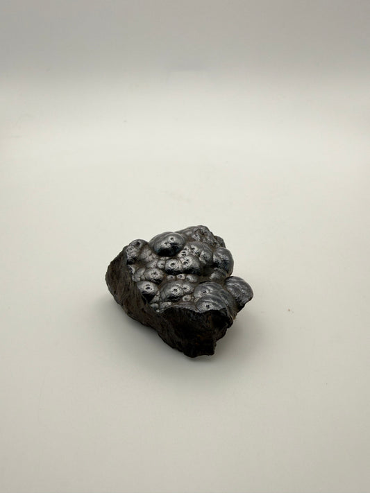 Small raw hematite specimen.