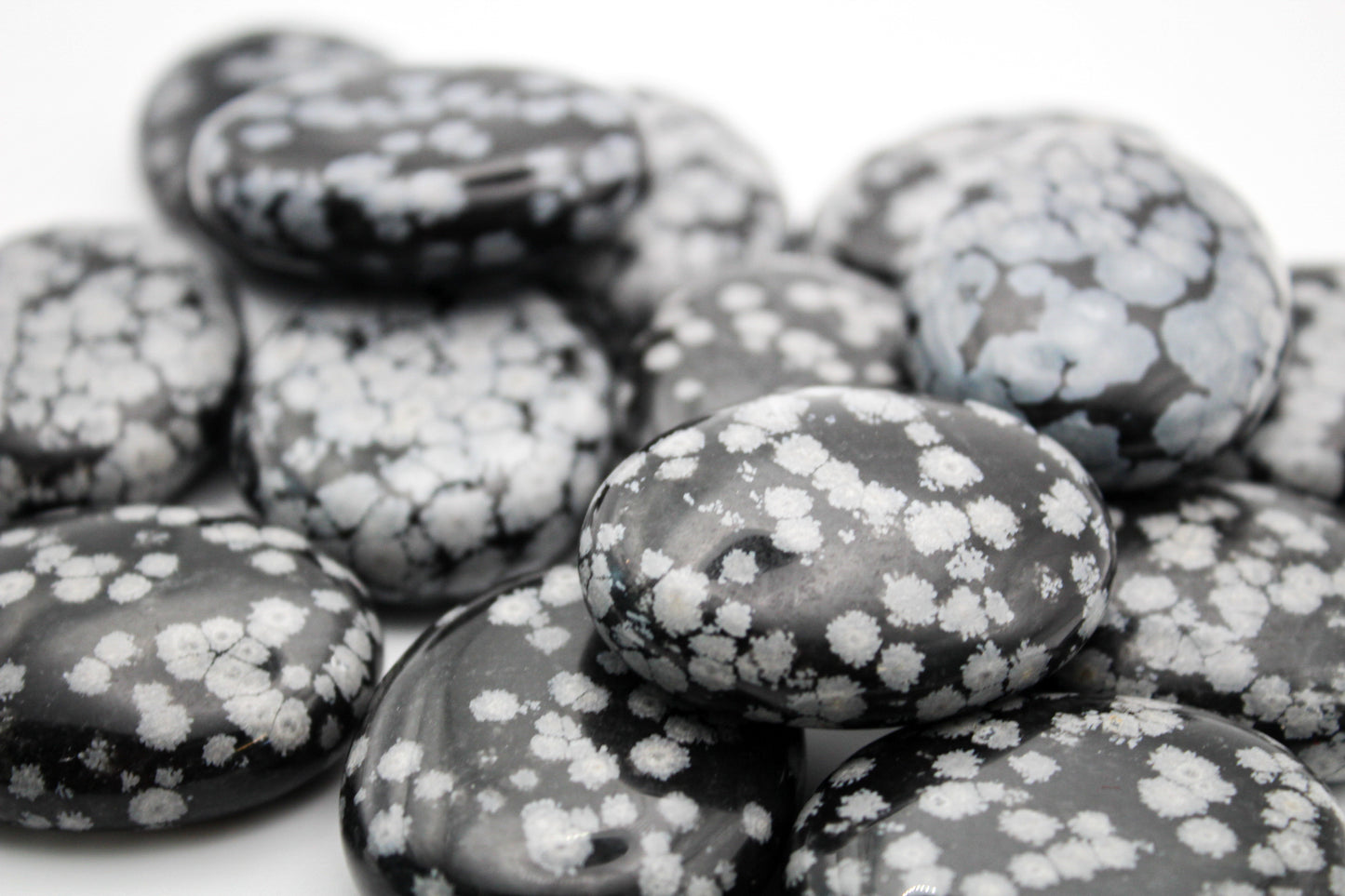 Snowflake Obsidian Pillows