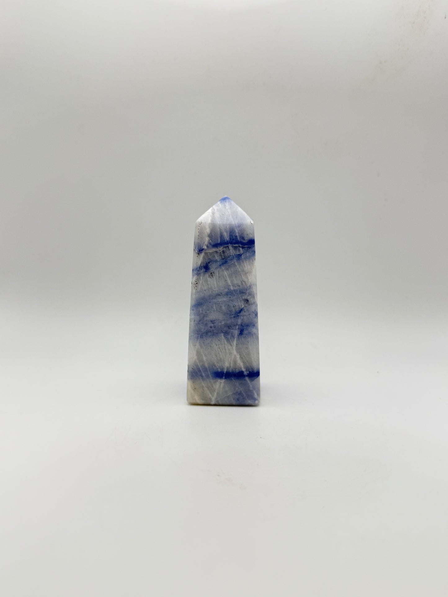 Afghanite four sided tower. Height of 3 1/2 inches, width of 1 1/4 inches.