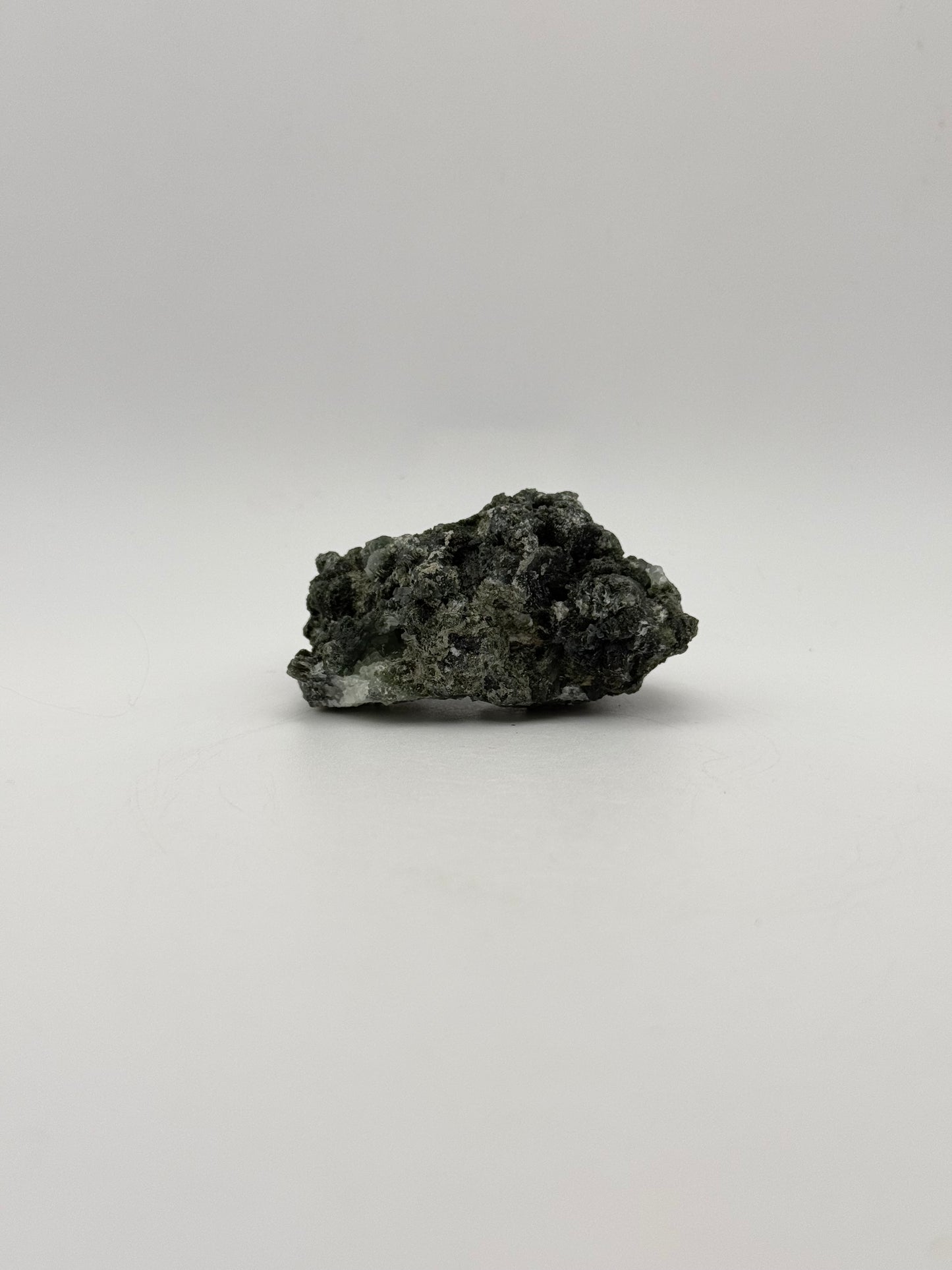 Raw prehnite specimen with amazing green color.