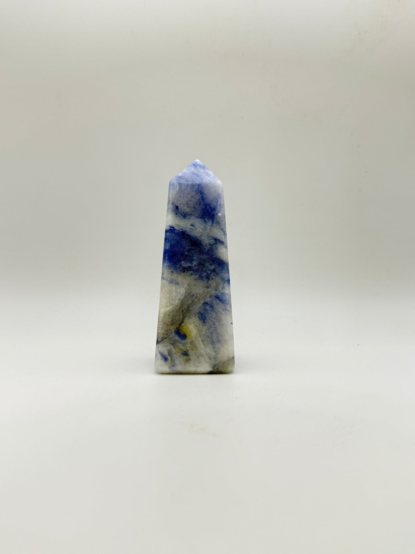 Afghanite four sided tower. Height of 3 1/2 inches, width of 1 1/4 inches.