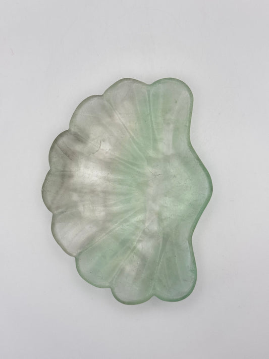 Polished Fluorite crystal bowl in the shape of a shell.