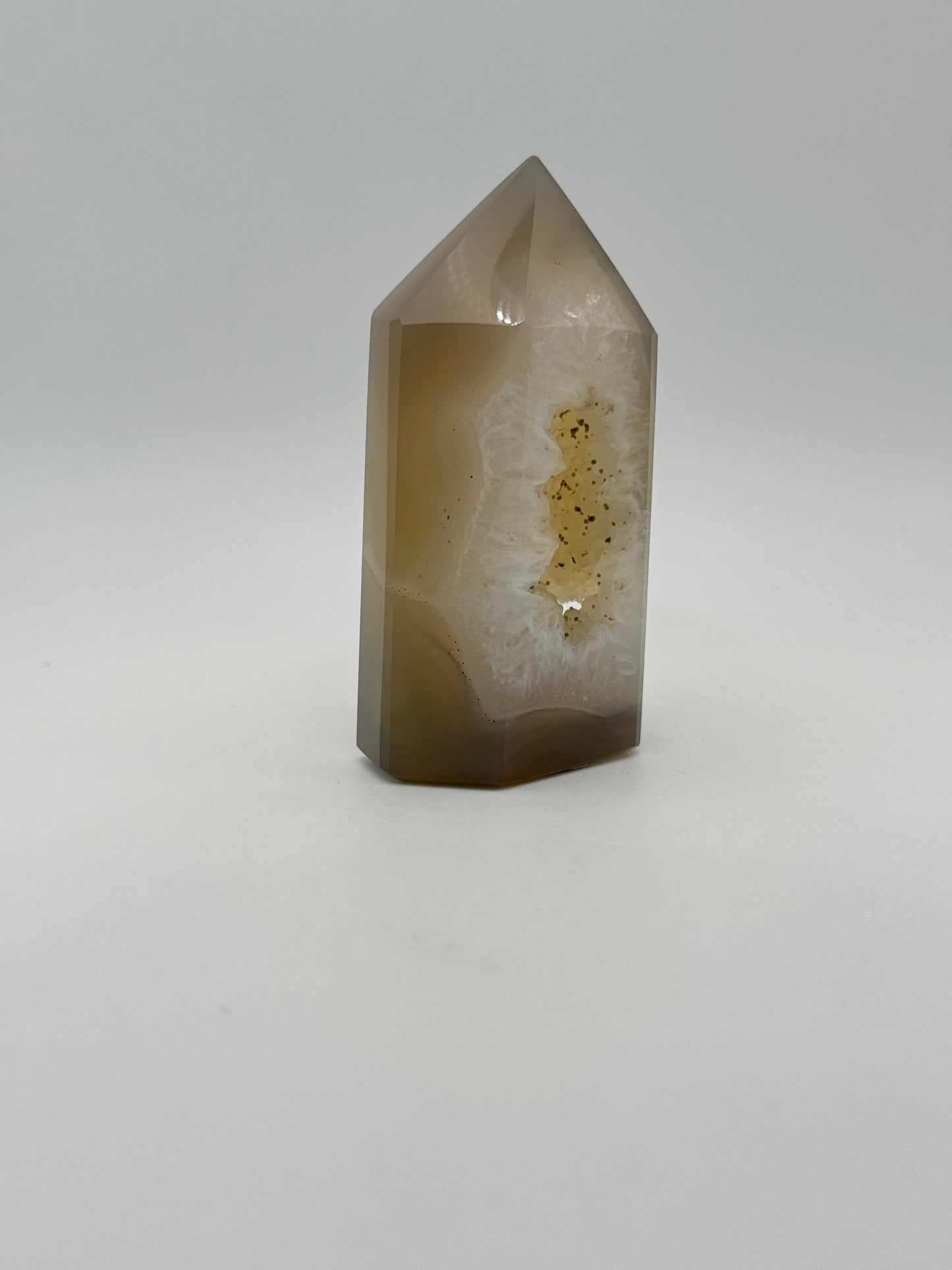 Polished druzy agate tower. About 3 inches tall.