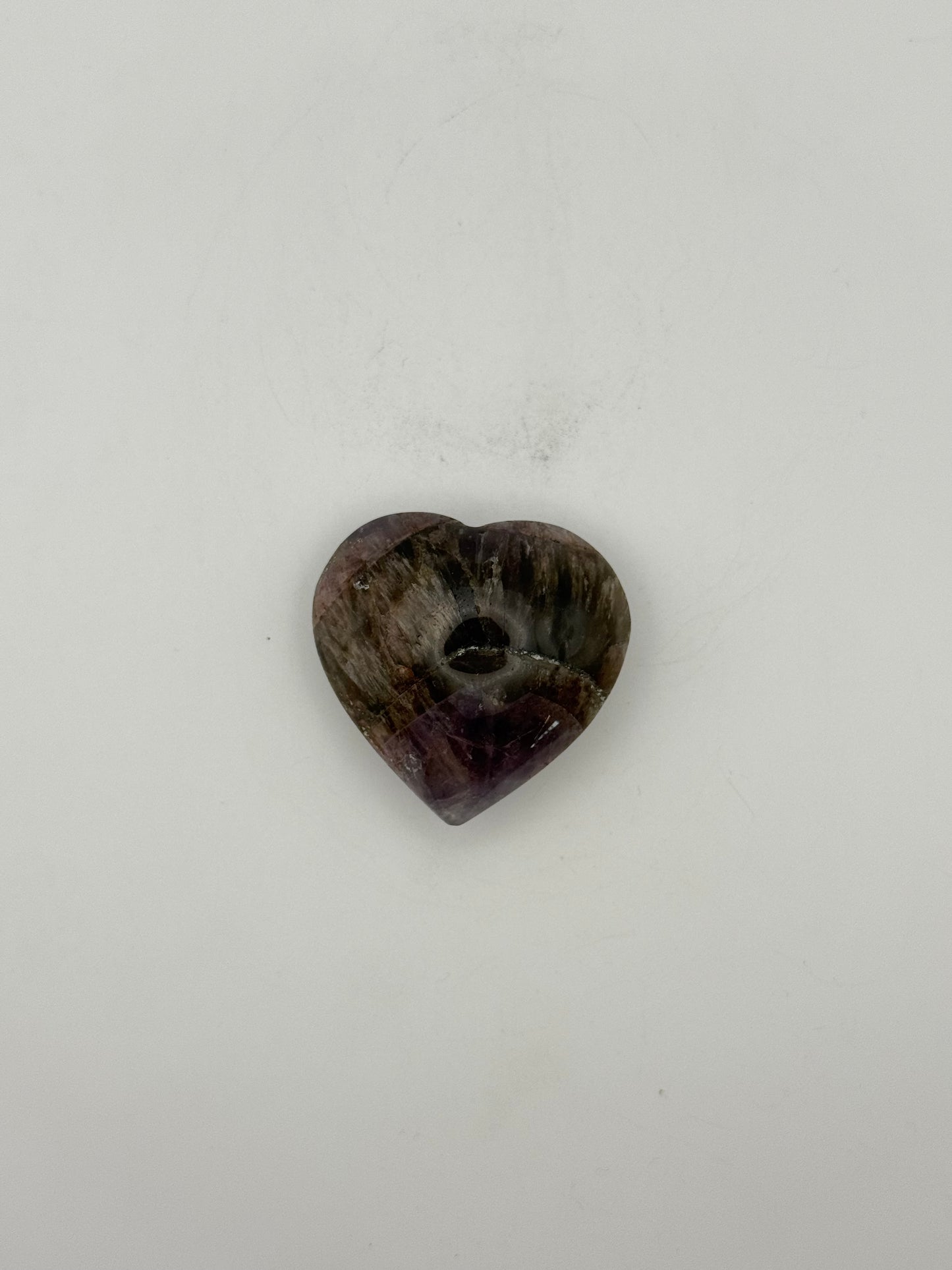 Polished super 7 in the shape of a heart.