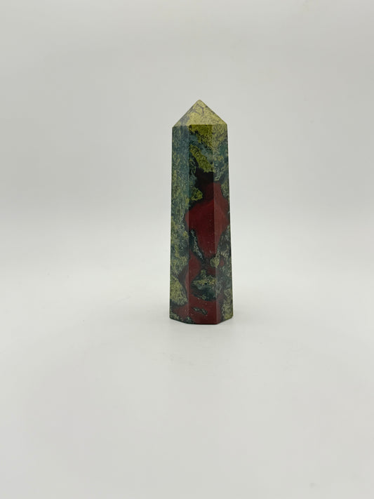 Polished Dragon Bloodstone in the shape of a tower.