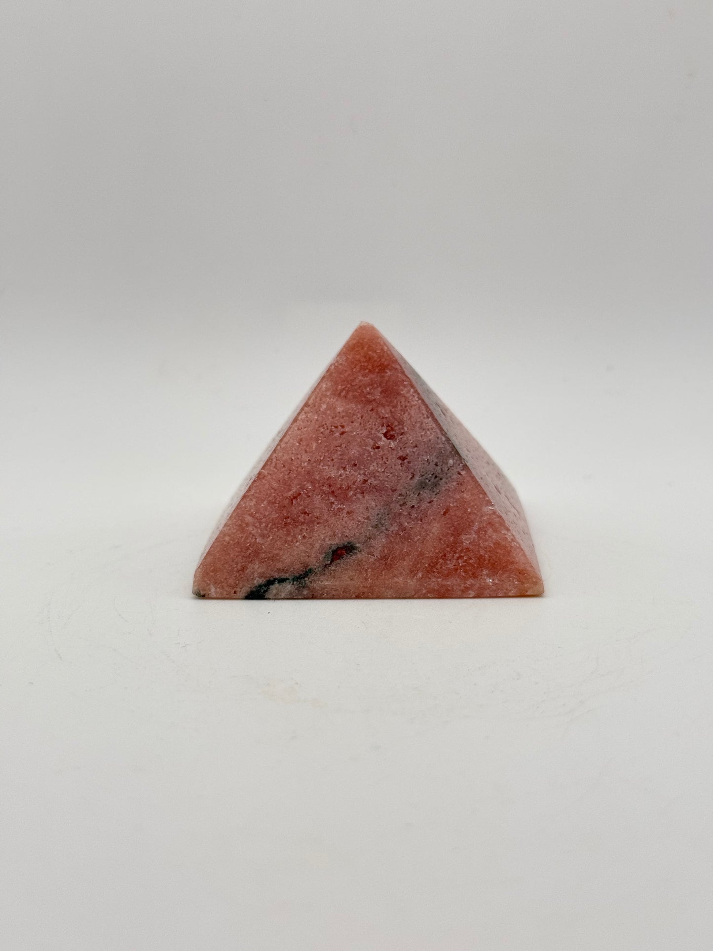 Polished Pink Amethyst pyramid.