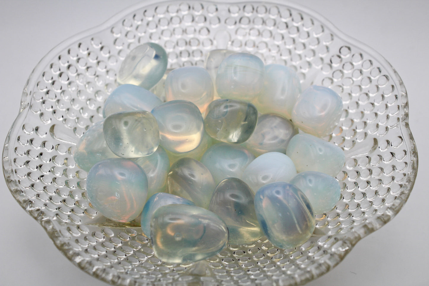 A collection of polished opalite tumbles.