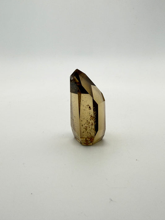 Polished natural citrine point.