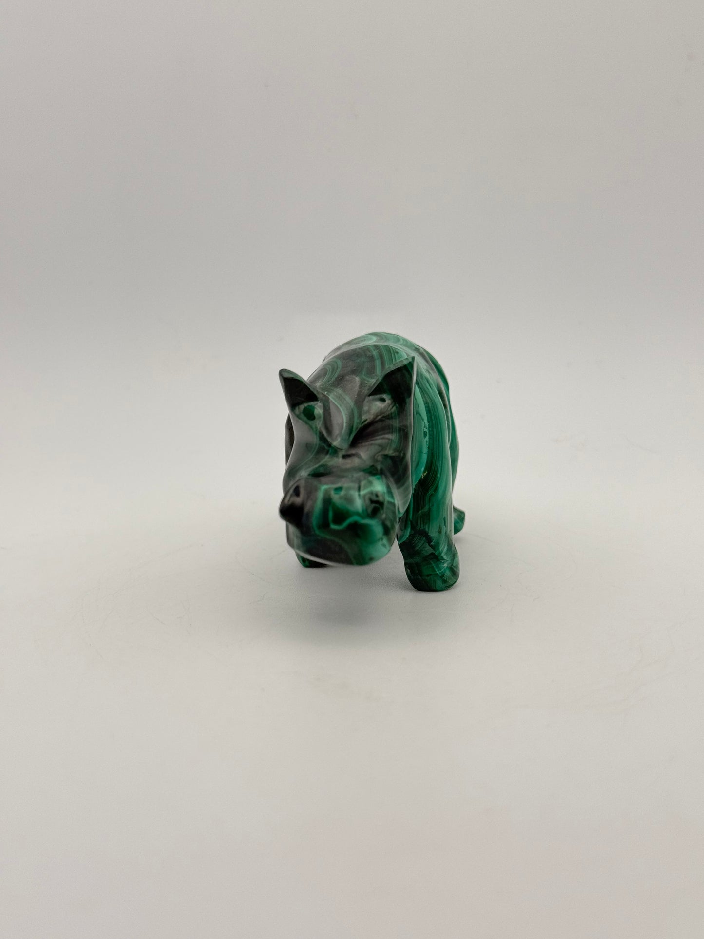 Malachite rhino carving.