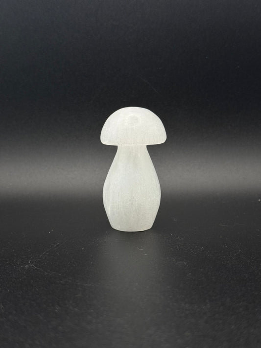 Selenite in the shape of a mushroom.