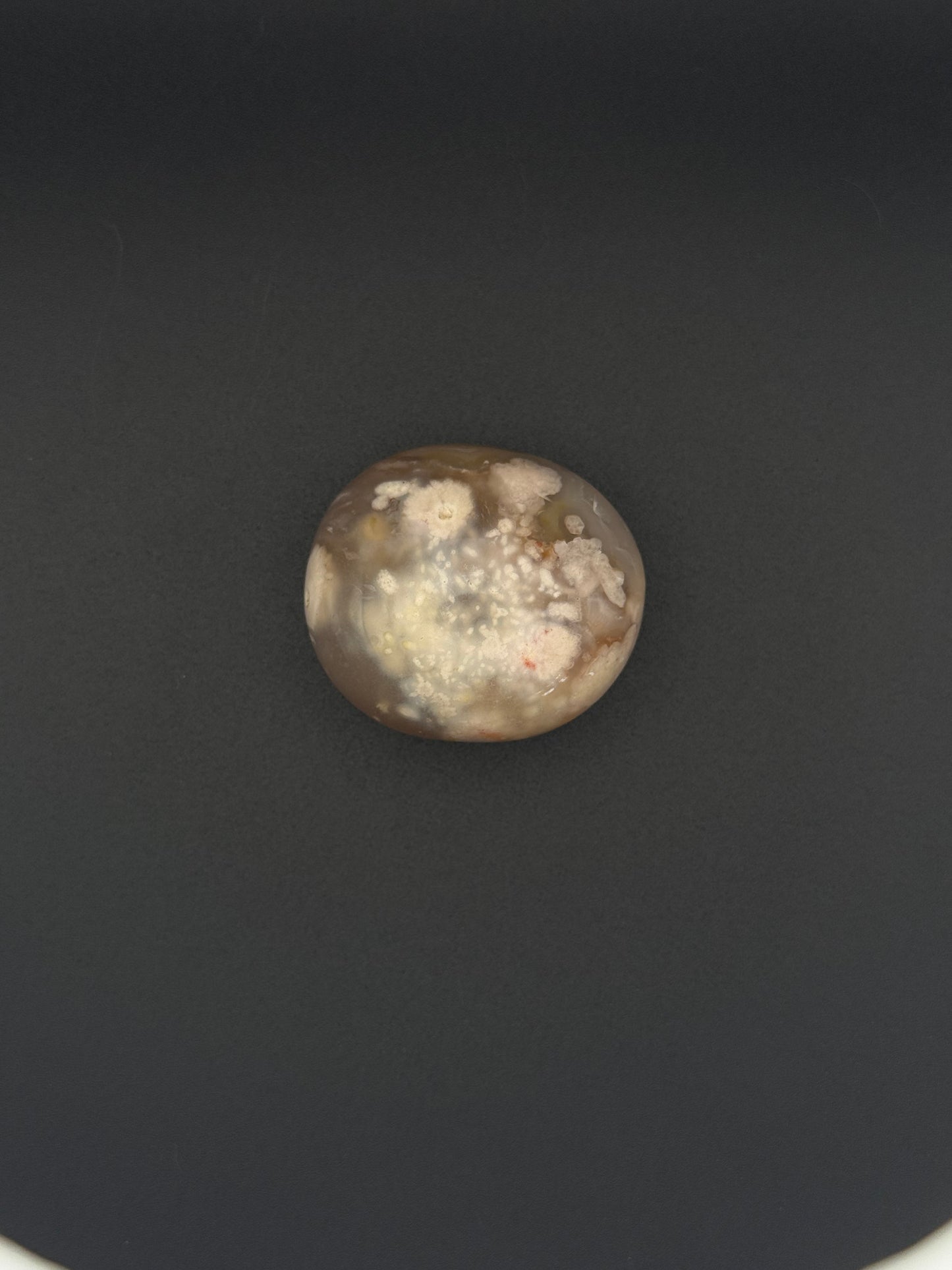 Flower agate polished crystal palm stone.