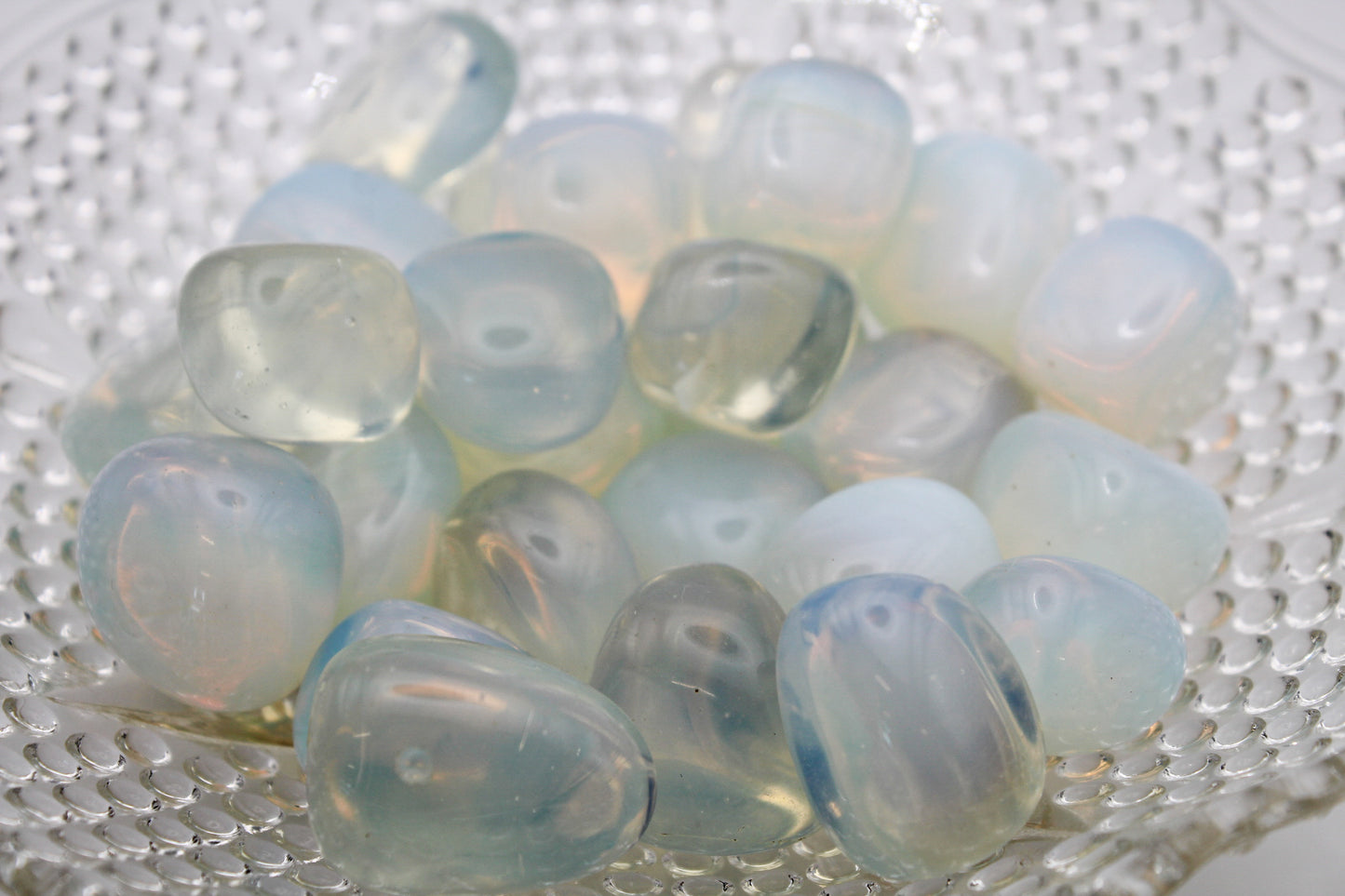 A collection of polished opalite tumbles.