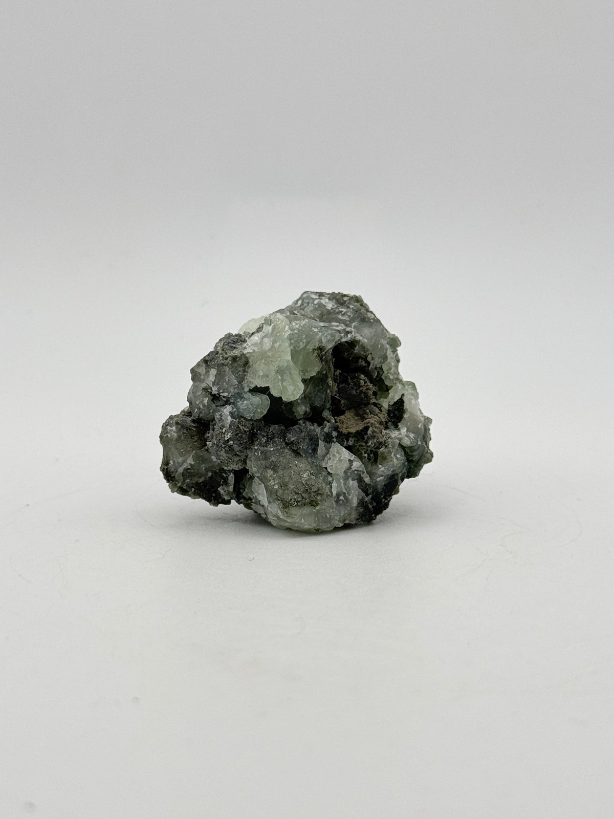 Raw prehnite specimen with amazing green color.