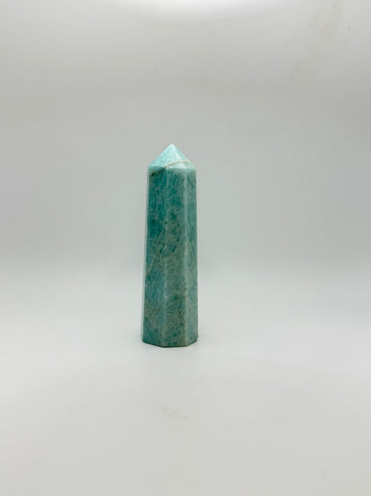 Amazonite tower with eight sides, that is about 4inches tall with a width of 1 1/4inches.