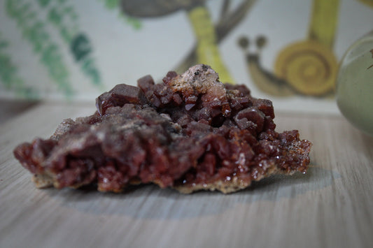 Vanadinite specimen with amazing sparkly red crystal formations.