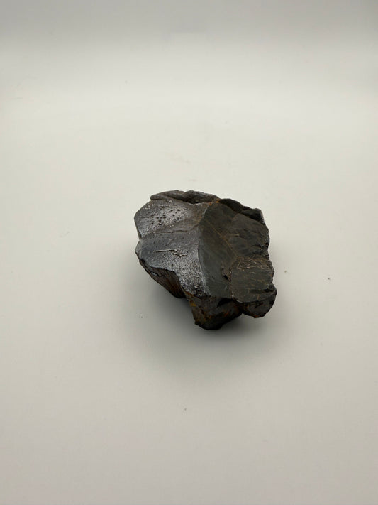 Small raw hematite specimen.
