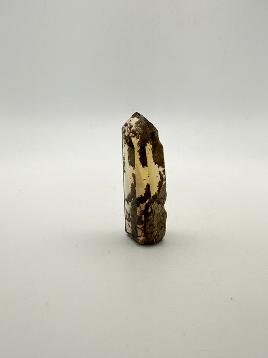 Polished natural citrine point.