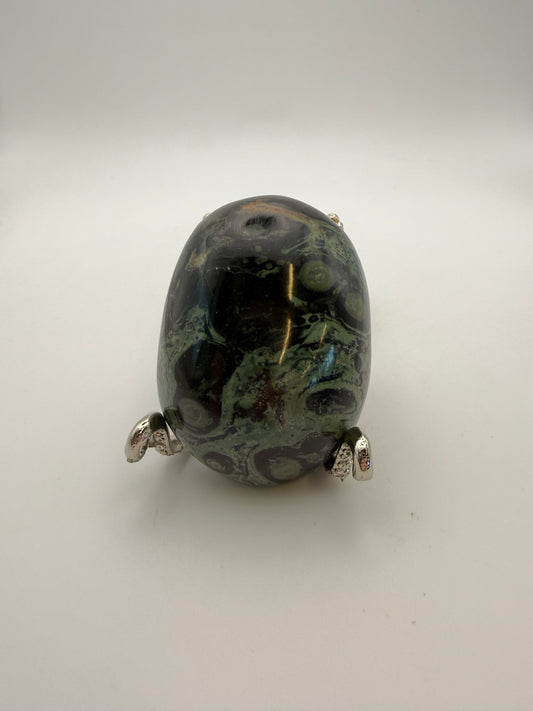 Polished kambaba jasper palm stone.