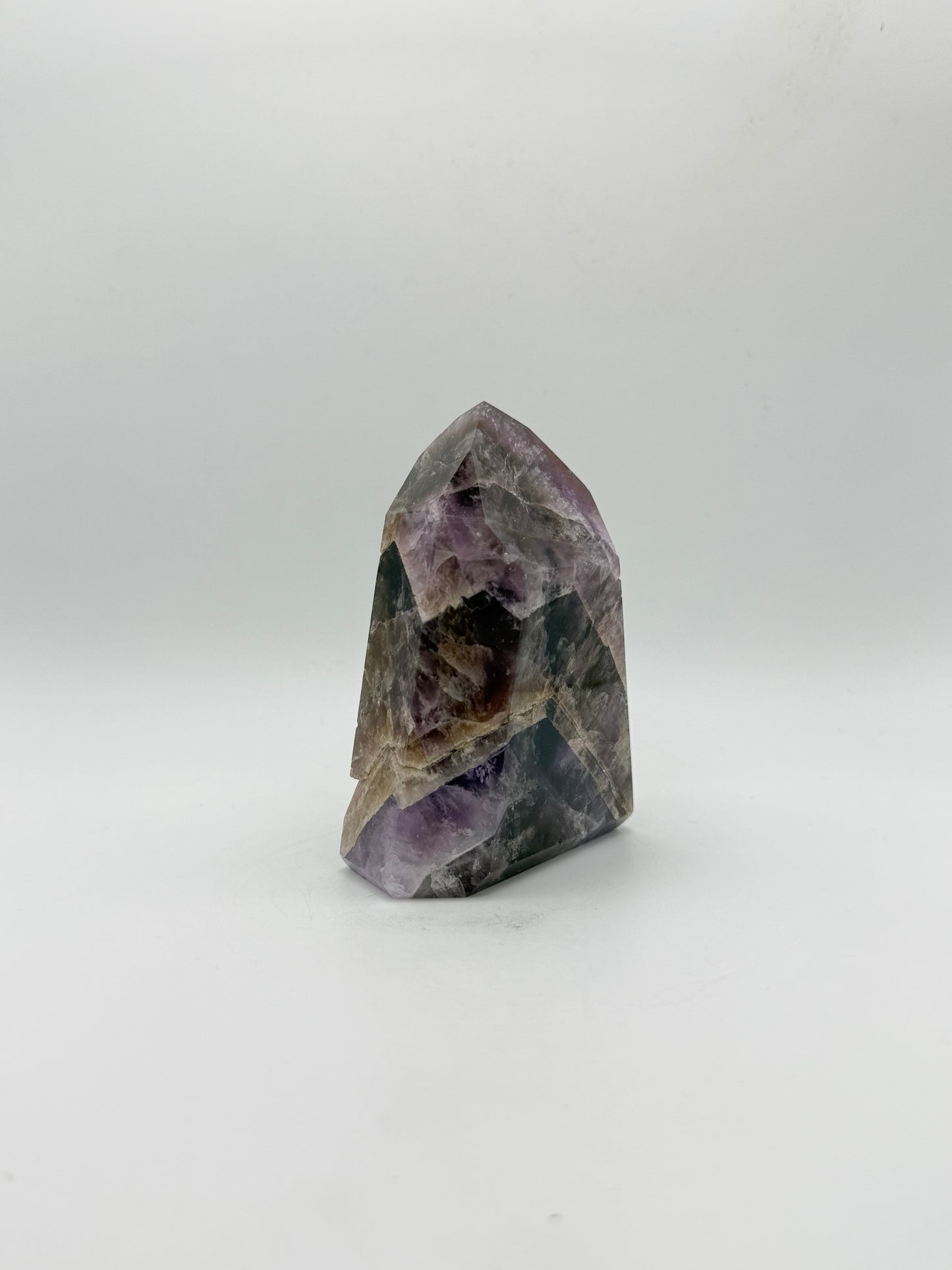 Polished super 7 in the shape of a tower.