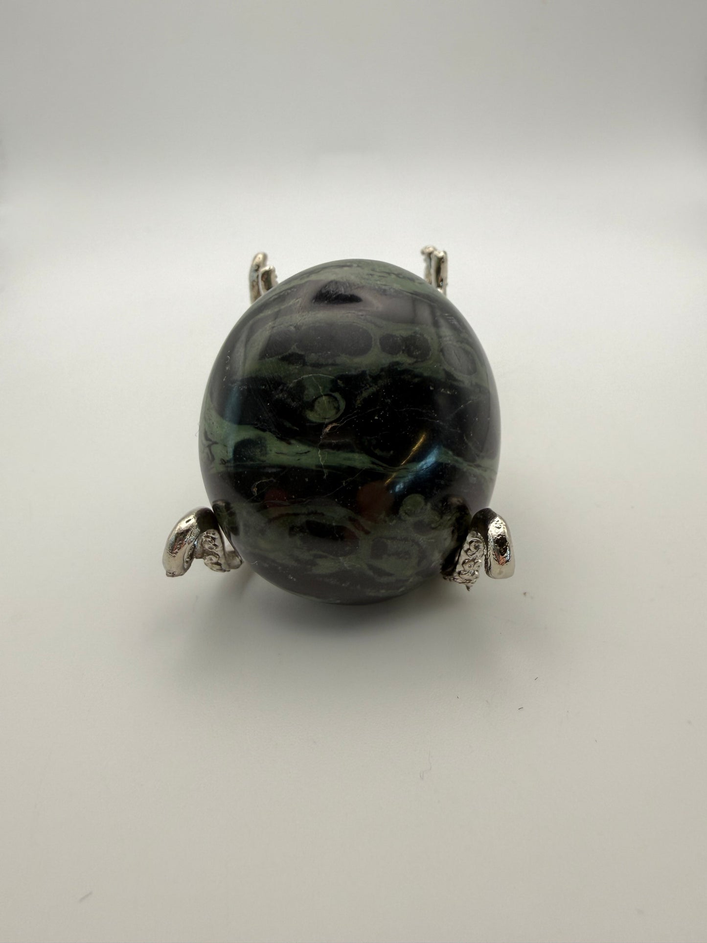 Polished kambaba jasper palm stone.