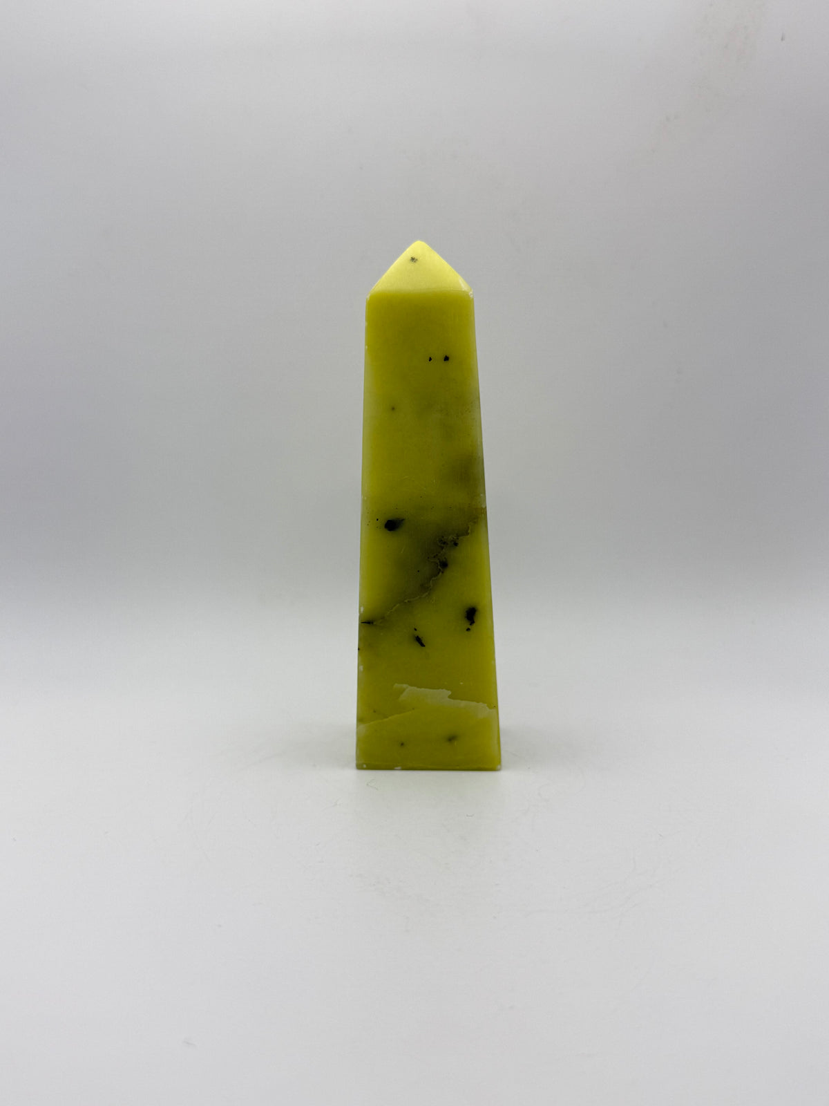Polished healerite four sided tower.