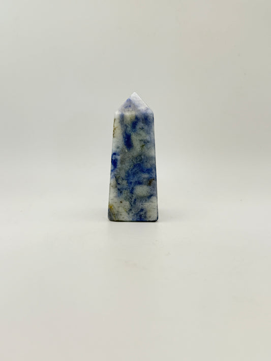 Afghanite four sided tower. Height of 3 inches, width of 1 1/8 inches.