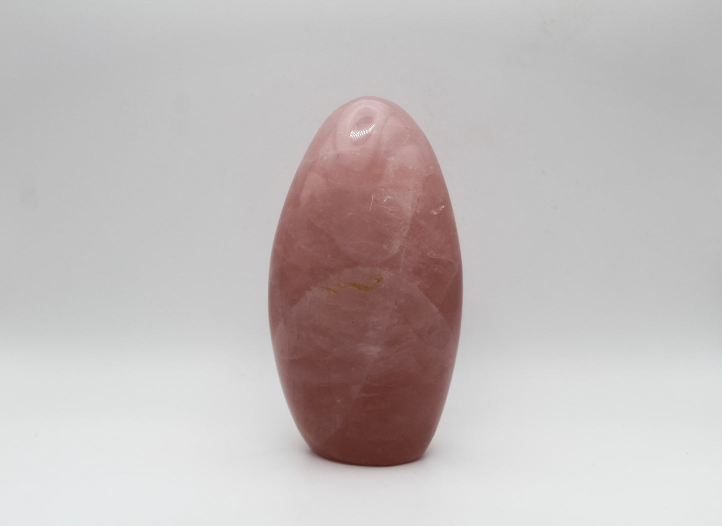 Polished rose quartz free form.
