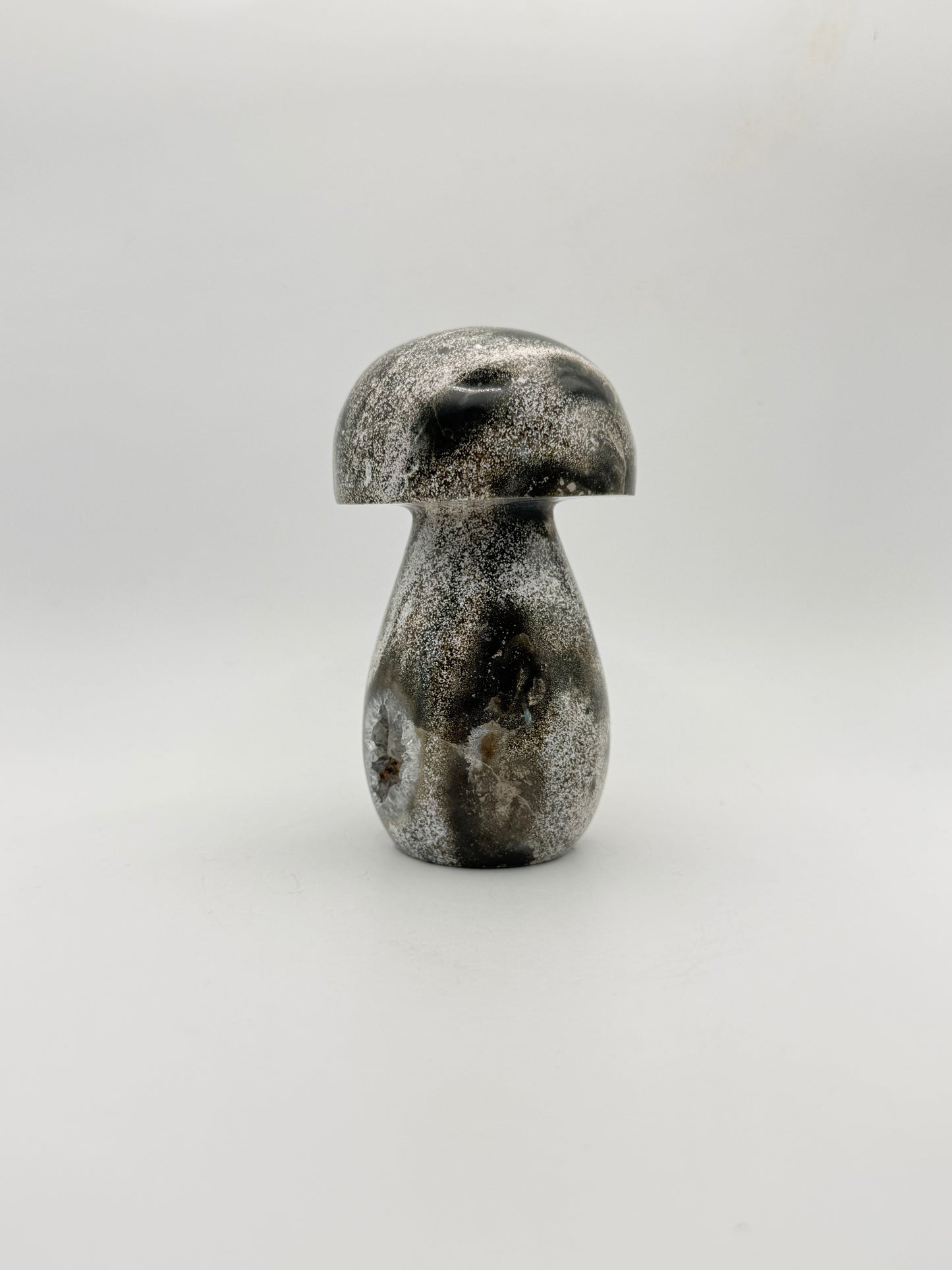 Ocean jasper stone in the shape of a mushroom.