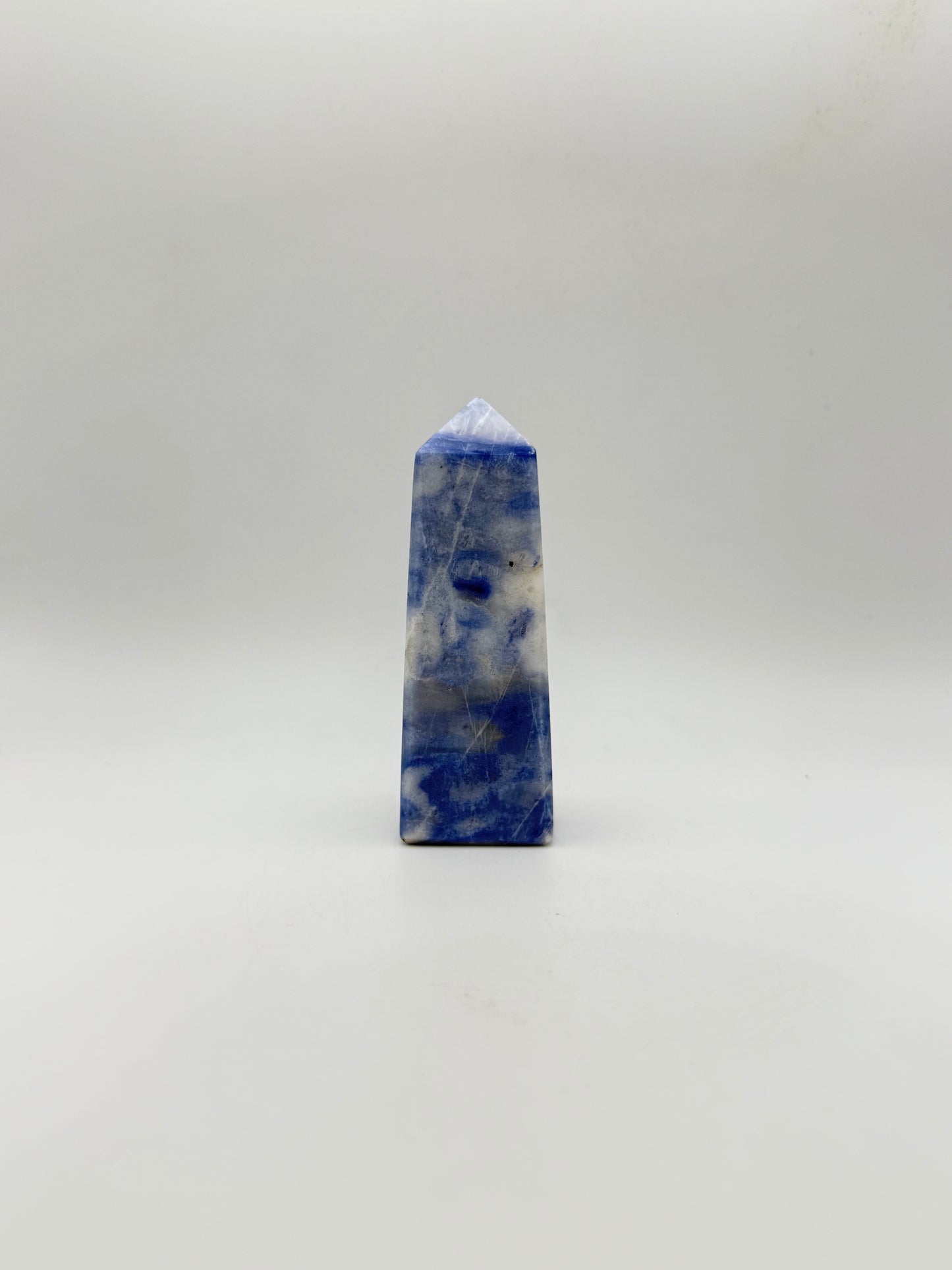 Afghanite four sided tower. Height of 3 1/2 inches, width of 1 1/4 inches.