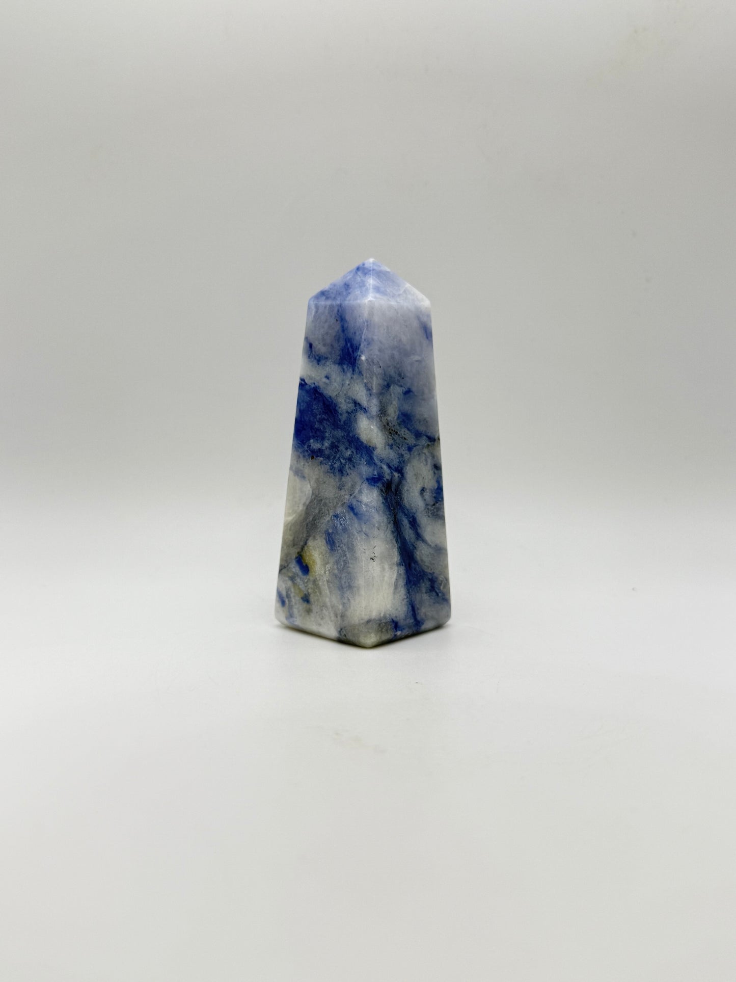 Afghanite four sided tower. Height of 3 1/2 inches, width of 1 1/4 inches.
