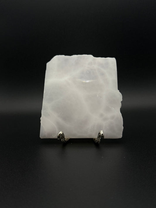 Polished pink calcite slab. Pink calcite glows under uv light.