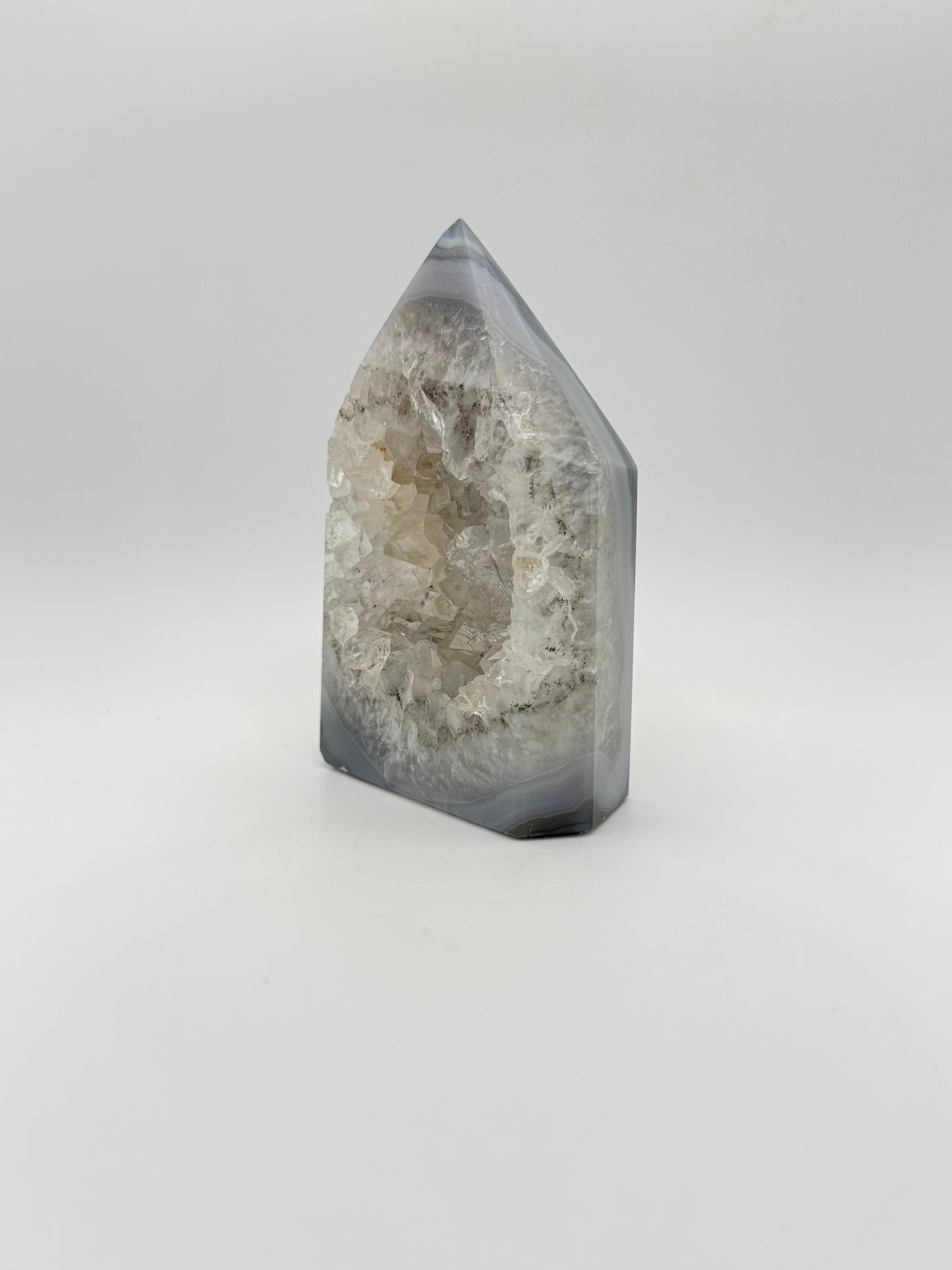 Polished druzy agate tower. a little over 4 inches tall.