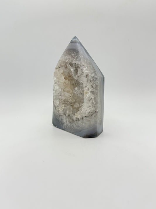 Polished druzy agate tower. a little over 4 inches tall.