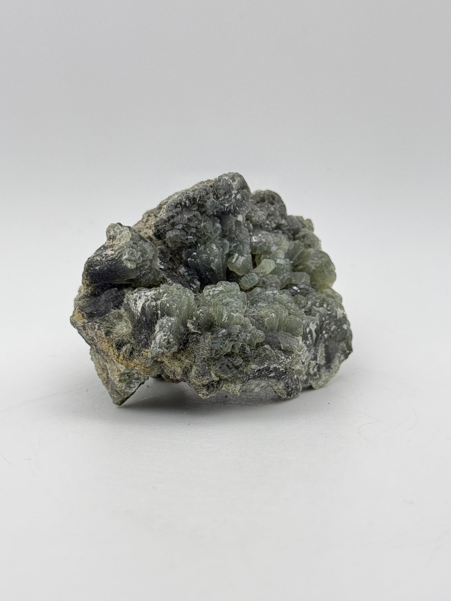 Raw prehnite specimen with amazing green color.