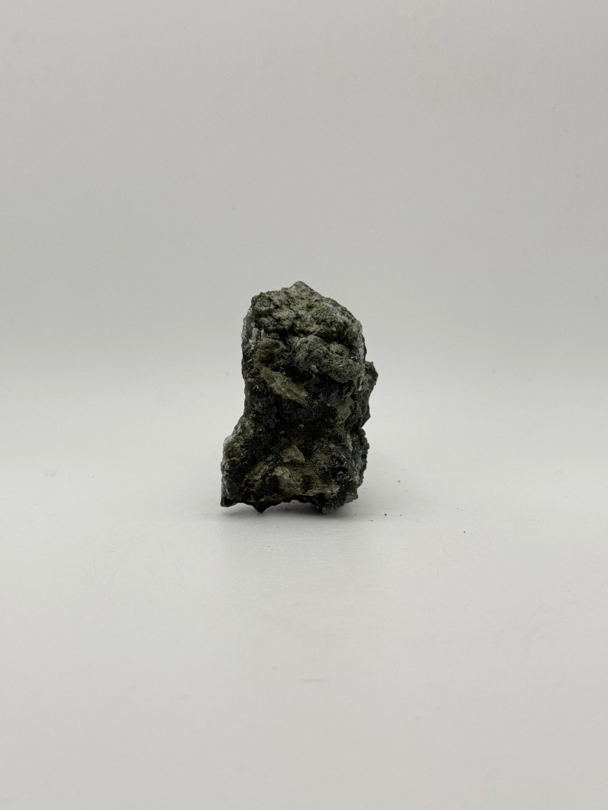 Raw prehnite specimen with amazing green color.