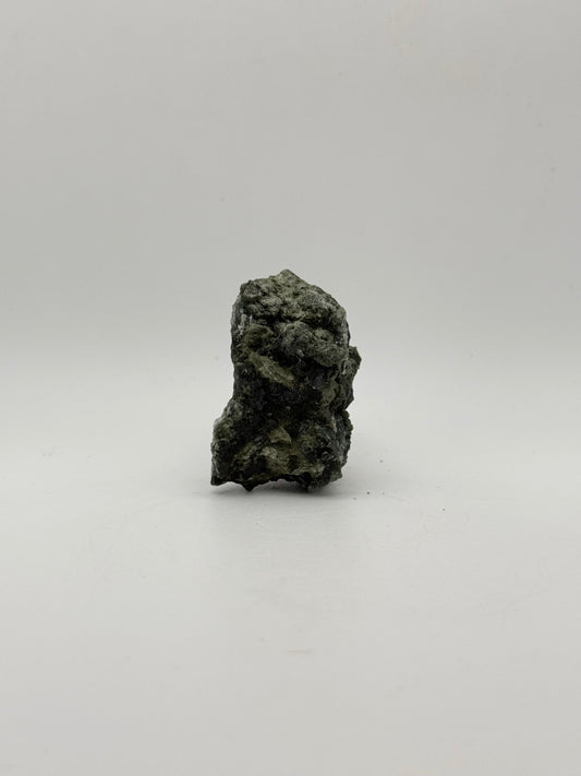 Raw prehnite specimen with amazing green color.