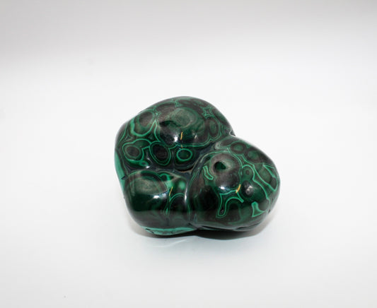 A vibrant green malachite free form.