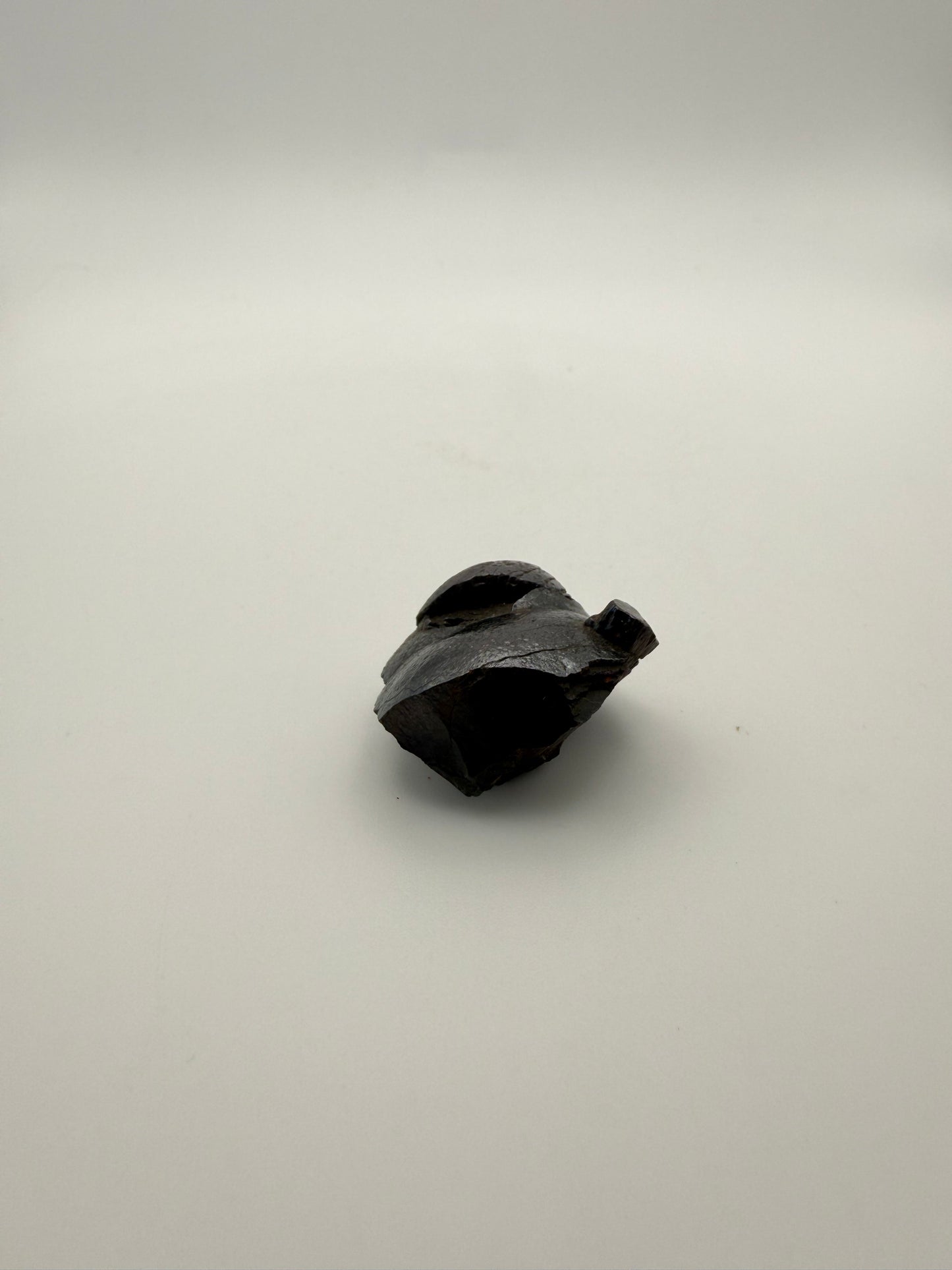 Small raw hematite specimen.