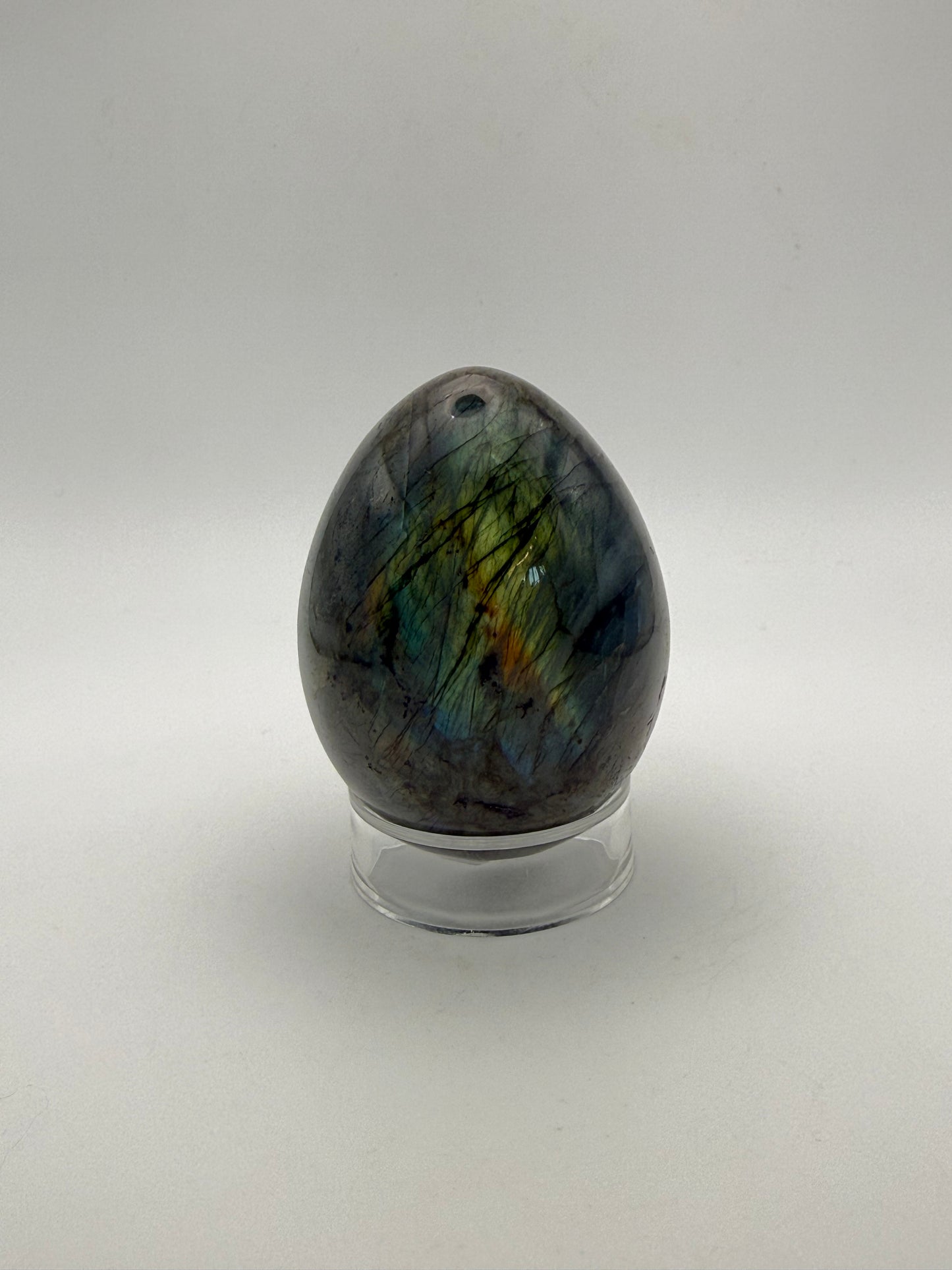 Labradorite polished stone in the shape of an egg.