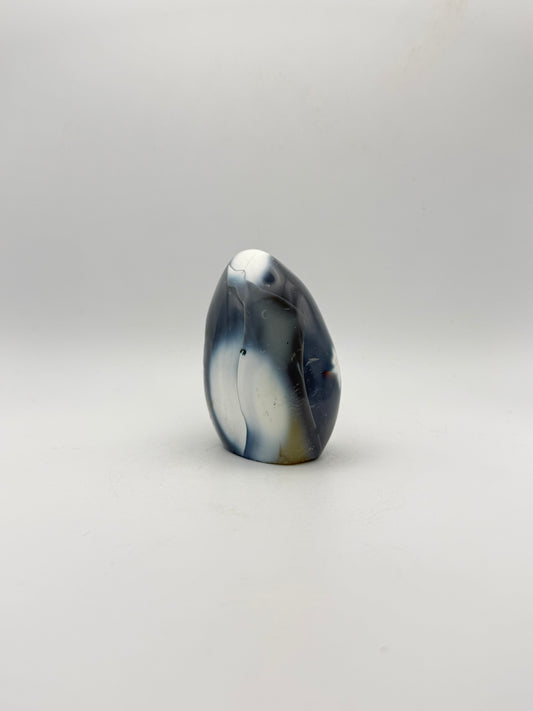 Polished orca agate free form.
