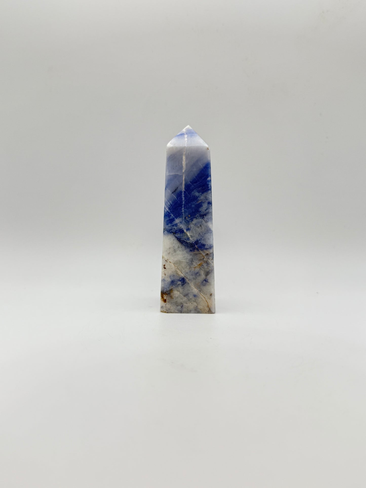 Afghanite four sided tower. Height of 3 5/8 inches, width of 1 1/8 inches.