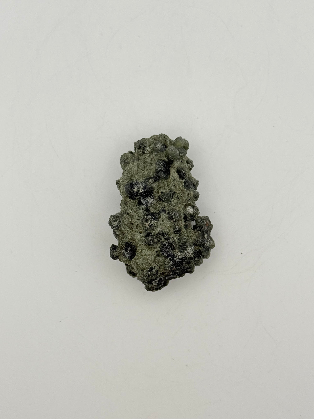 Raw prehnite specimen with amazing green color.