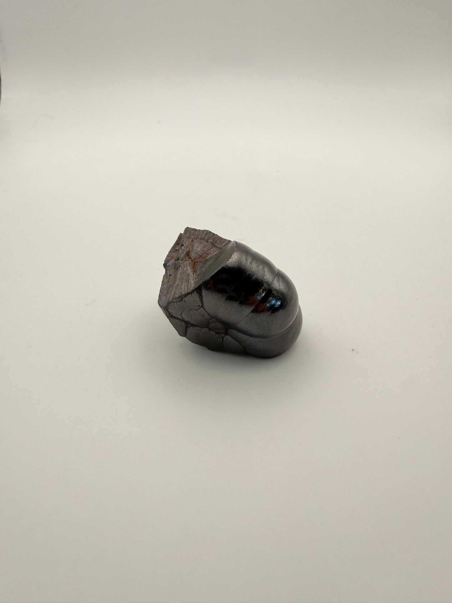 Small raw hematite specimen.
