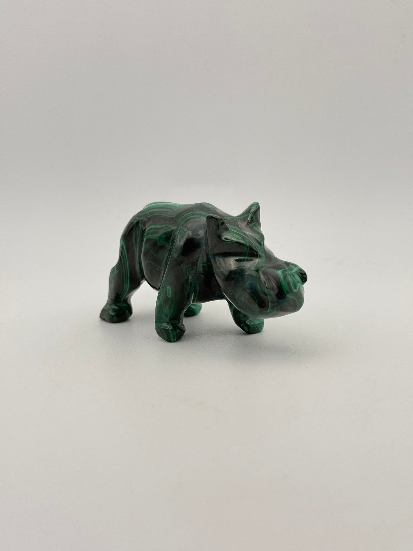 Malachite rhino carving.