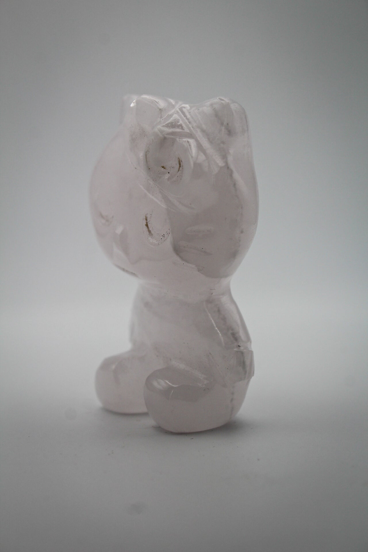 Pink Calcite crystal in the shape of Hello Kitty.