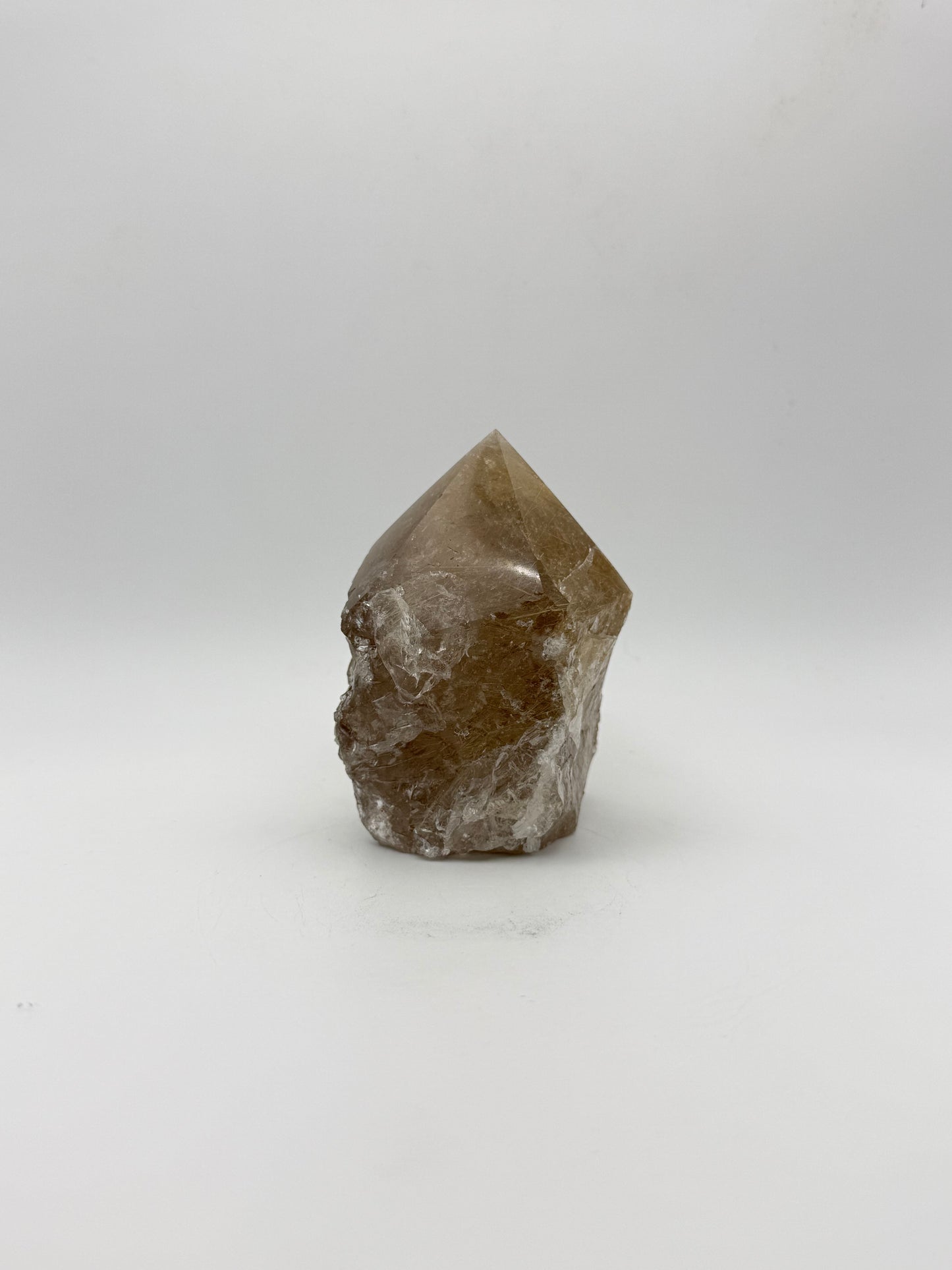Smoky quartz tower with the top side polished and bottom natural.