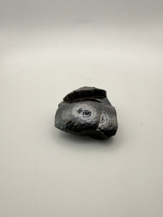 Small raw hematite specimen.