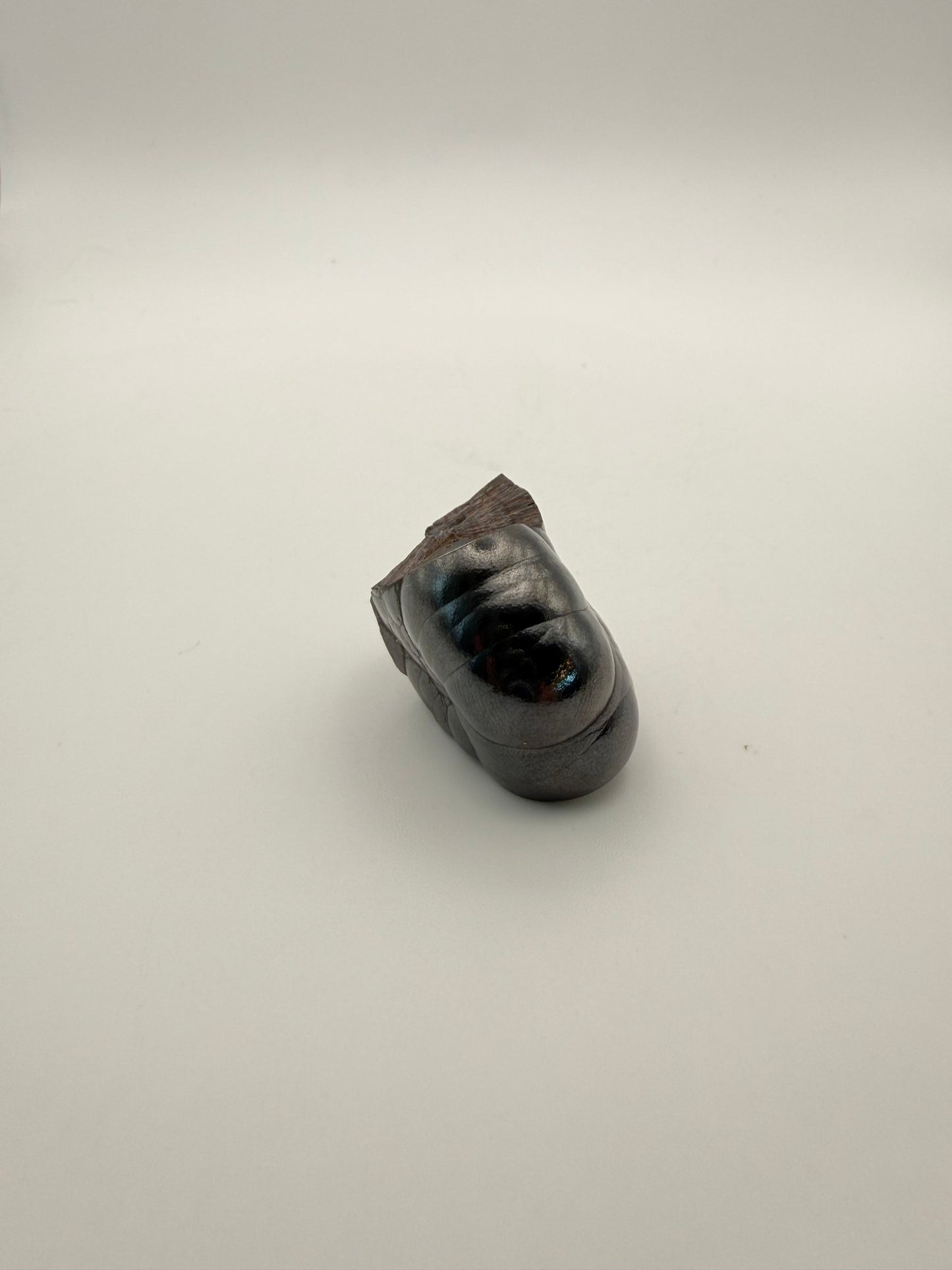 Small raw hematite specimen.